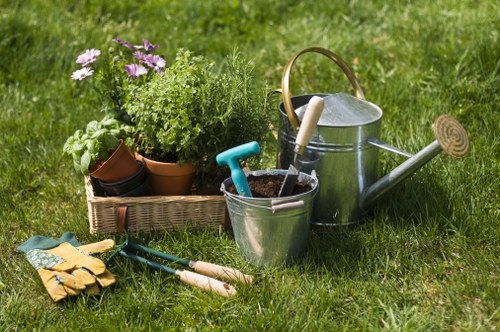 Gardening tools and van outside suburban Abbey Wood terrace